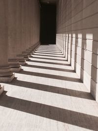 Shadow of columns on wall