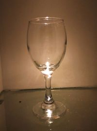 Close-up of beer glass on table