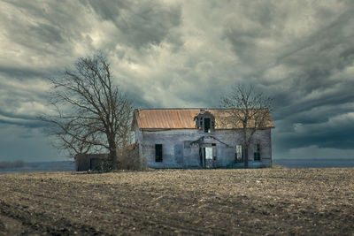 Old house with ominous sky