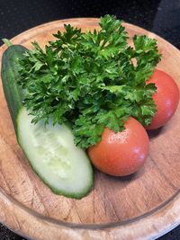 High angle view of vegetables in plate on table