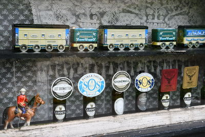 Full frame shot of various bottles on wall