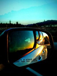 Reflection of car on road