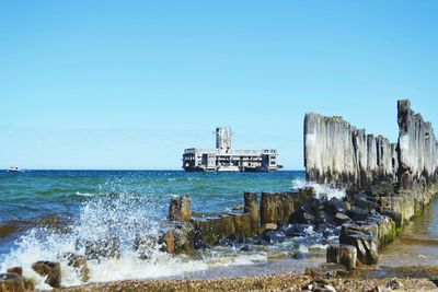 Scenic view of sea against clear sky