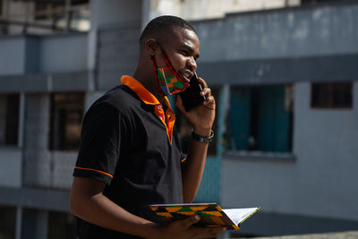 Young man using mobile phone