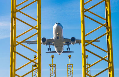 High section of built structure against blue sky