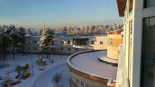 High angle view of houses in town during winter