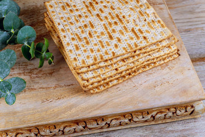 High angle view of bread on cutting board