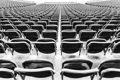 Empty chairs in stadium