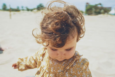 Portrait of cute boy at beach