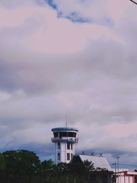 Low angle view of building against sky at dusk