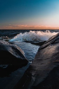 Scenic view of sea against sky during sunset