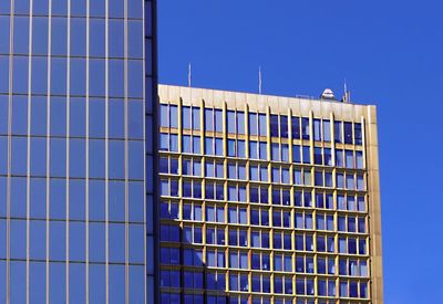 Low angle view of modern building against clear sky