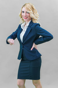 Portrait of smiling man against white background
