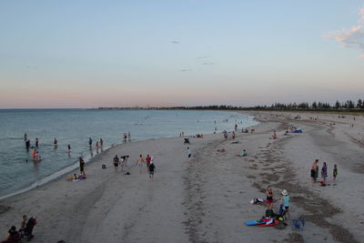 People enjoying at beach