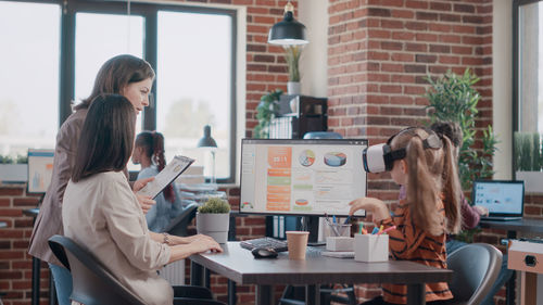 Business colleagues working at office