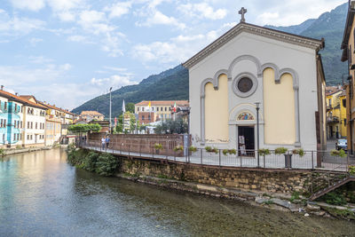 The historic center of omegna with beautiful buildings near the river