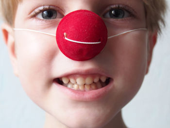 Close-up portrait of smiling boy