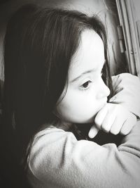 Close-up of cute girl with mother