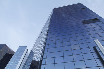 Low angle view of modern building against sky