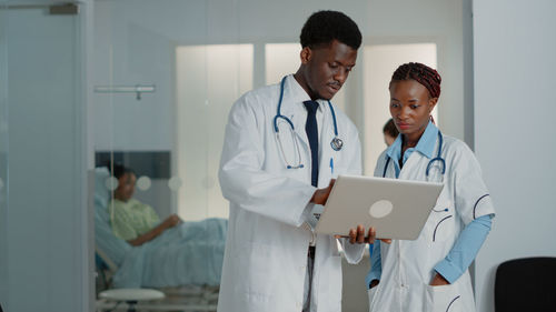 Doctor using digital tablet