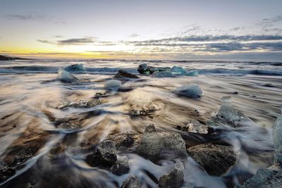 Scenic view of sea during sunset