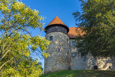 Low angle view of old building against sky