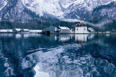 Scenic view of lake with mountains in background