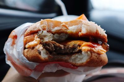 Close-up of hand holding bread