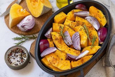 Close-up of fruits in bowl on table