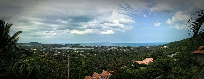 Scenic view of sea against cloudy sky