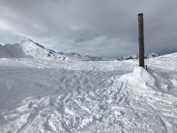 Scenic view of snow covered mountain against sky / austria 