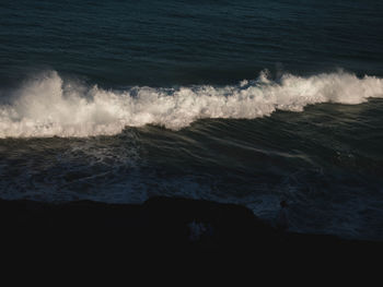 Waves splashing on rocks