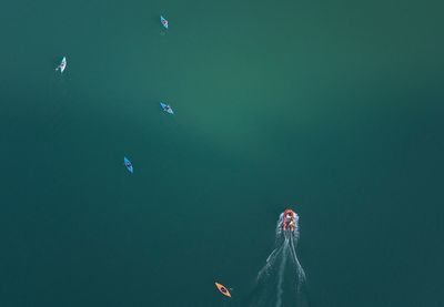 Aerial view of boats moving on sea