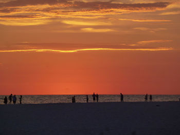 Scenic view of sea at sunset