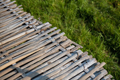 High angle view of stack of wood in forest