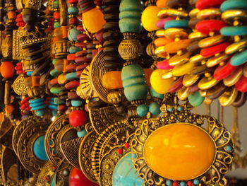 Close-up of multi colored necklace for sale in market