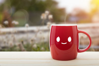 Close-up of coffee cup on table