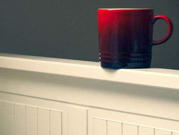 Close-up of coffee cup on table