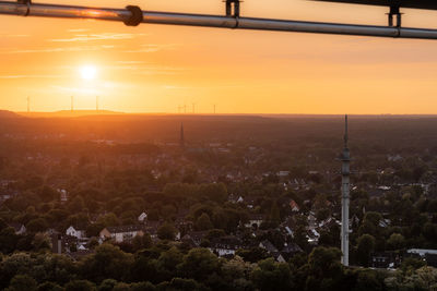 High angle view of townscape against sky during sunset