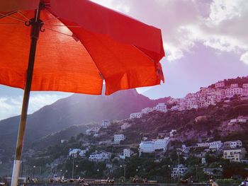 Scenic view of buildings in city against sky