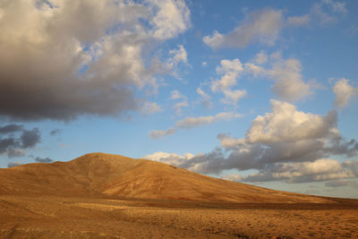 Scenic view of desert against sky