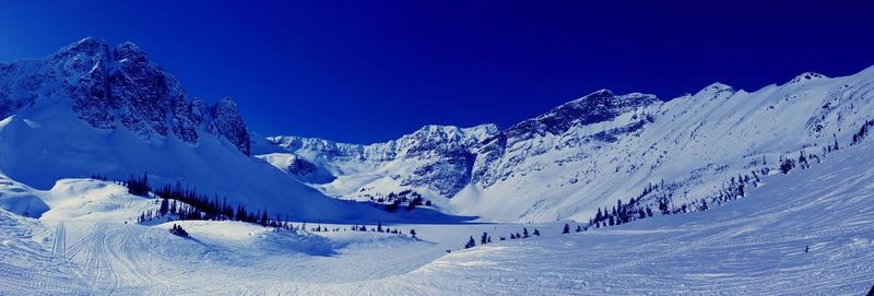 Scenic view of snow covered mountains