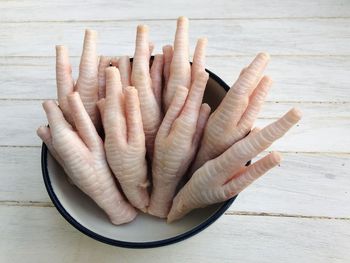 Close-up of hand on table