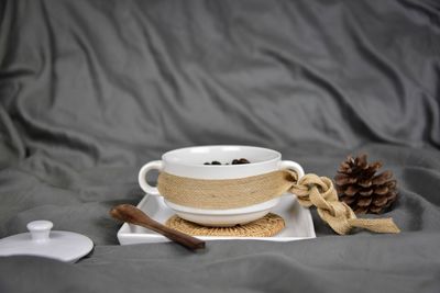 Close-up of coffee cup on table