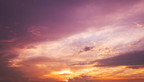 Low angle view of clouds in sky during sunset