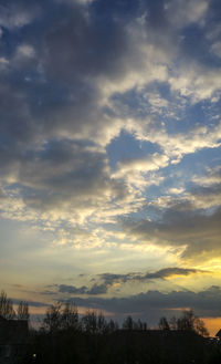 Scenic view of landscape against cloudy sky