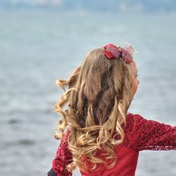 Rear view of woman looking at sea