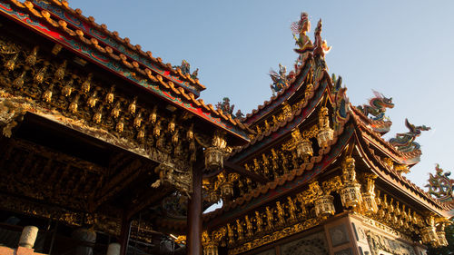 Low angle view of temple building against sky