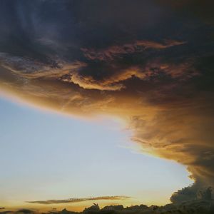 Scenic view of dramatic sky during sunset