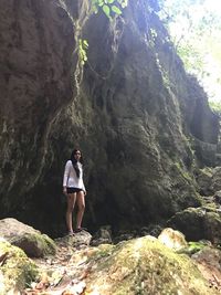 Full length of man standing on rock